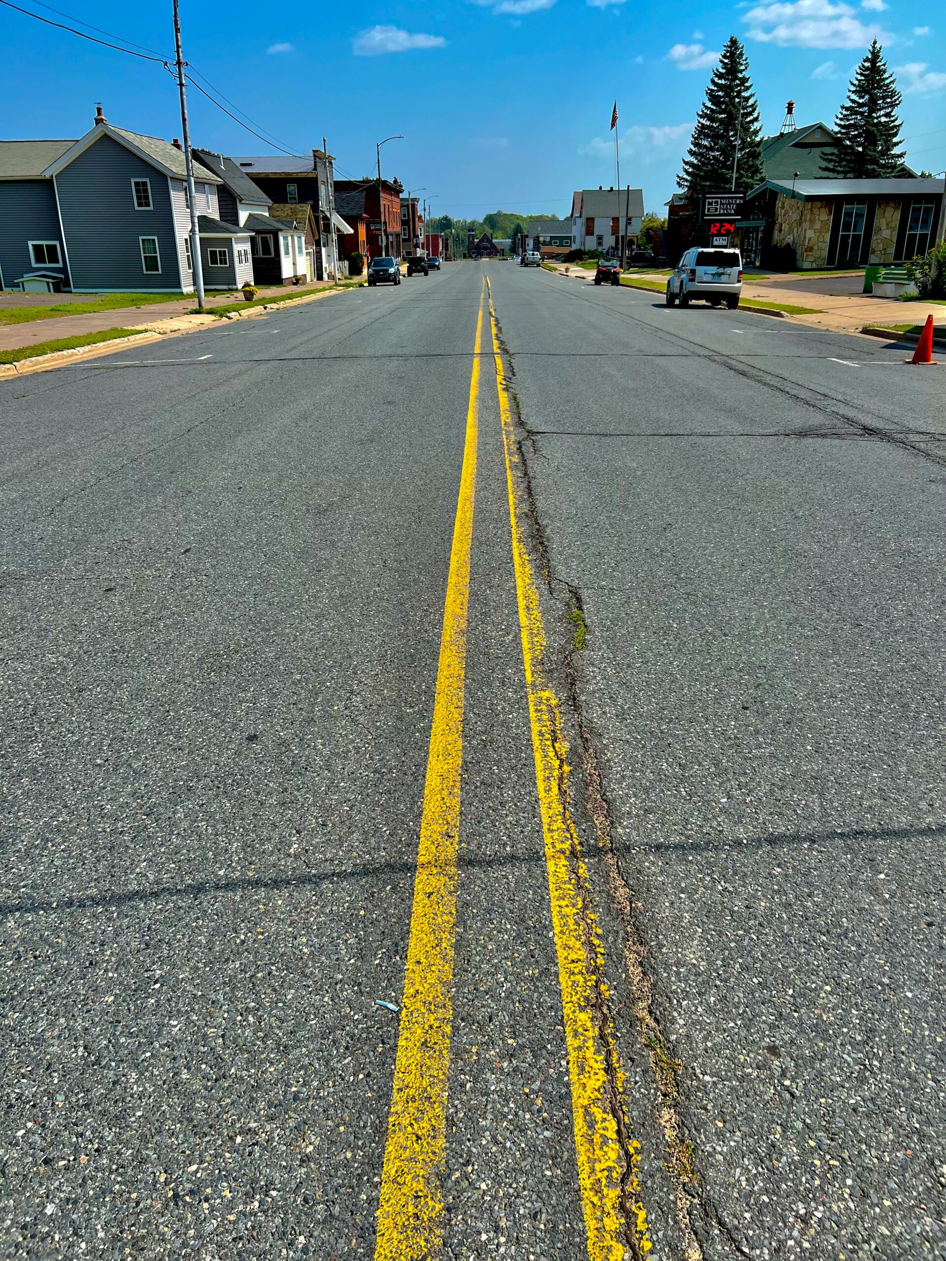 a street with a yellow line painted on it